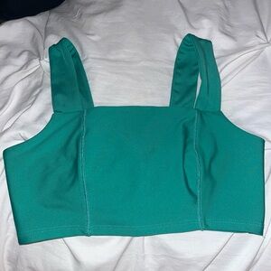 Becca green neck Sports bra XS never worn